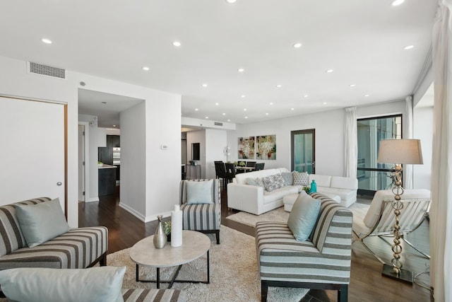 living room with wood-type flooring