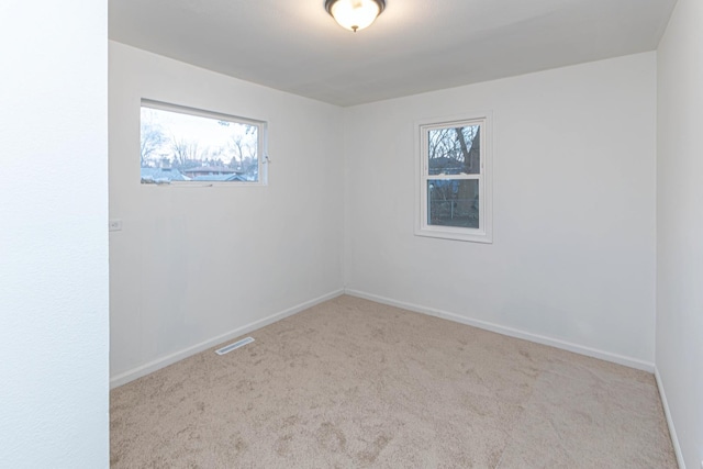 view of carpeted spare room