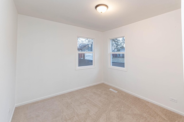 view of carpeted spare room