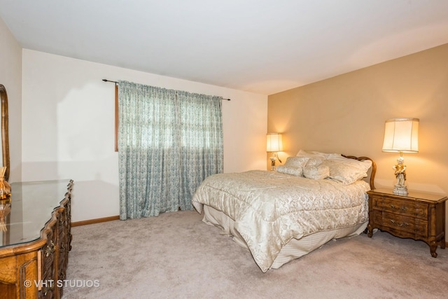 bedroom featuring carpet