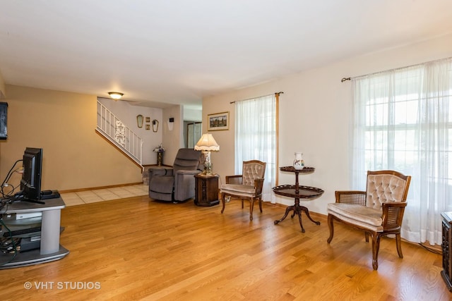 living area featuring plenty of natural light and light wood-type flooring