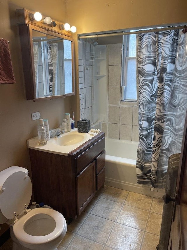 full bathroom featuring vanity, toilet, and shower / bath combo with shower curtain