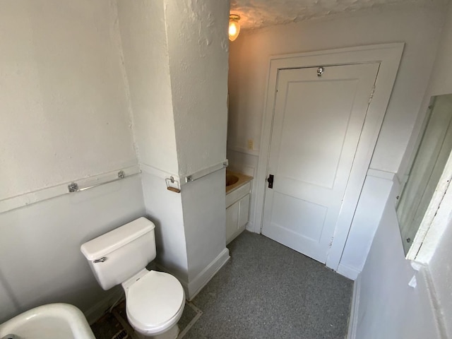 bathroom featuring toilet