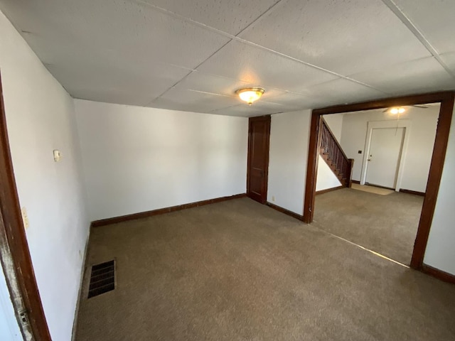 basement featuring carpet