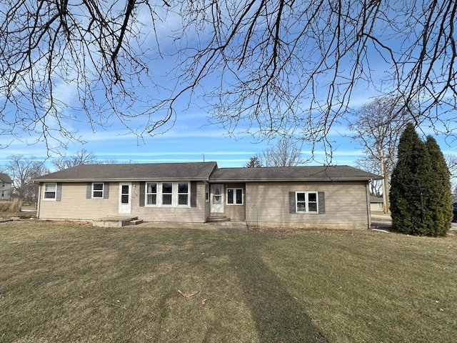 view of front of property with a front lawn