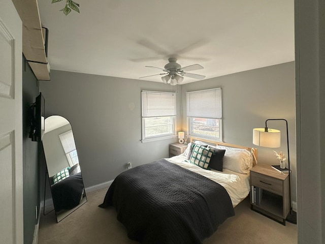 bedroom with light carpet and ceiling fan