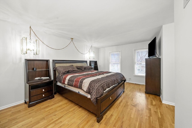 bedroom with light hardwood / wood-style flooring