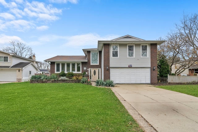 split level home with a garage and a front yard