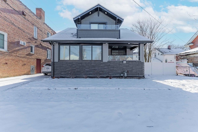 view of snow covered house