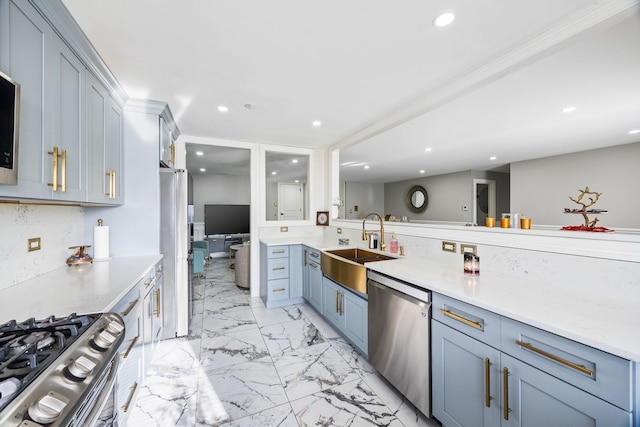 kitchen featuring stainless steel appliances and sink