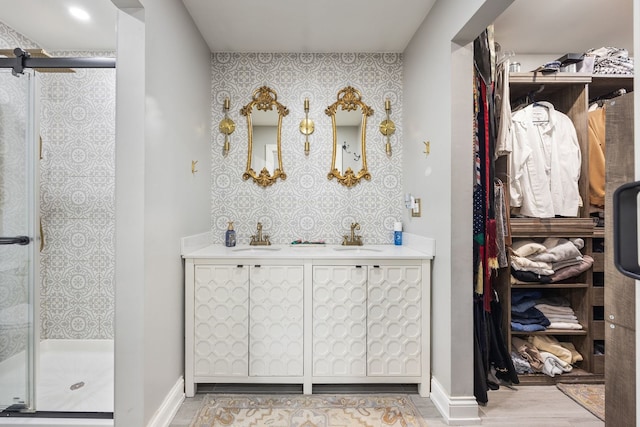 bathroom with vanity and walk in shower