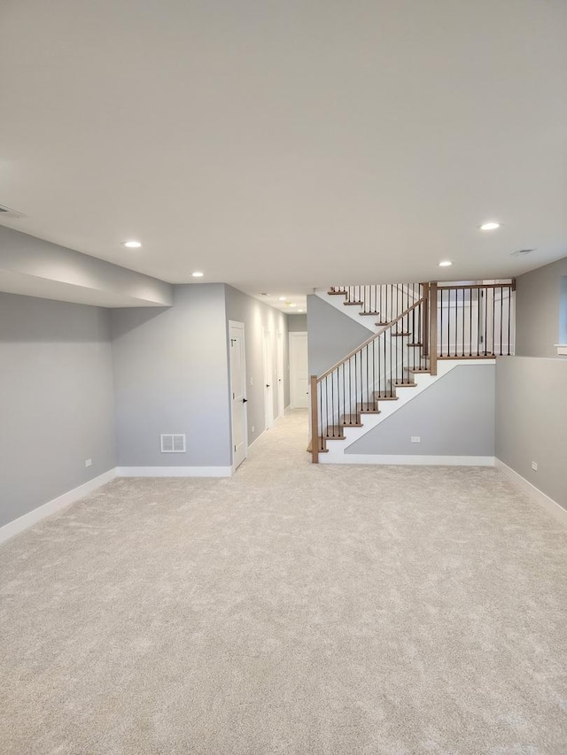 basement with light carpet