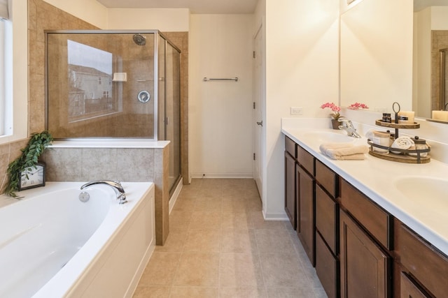 bathroom with vanity, tile patterned floors, and independent shower and bath