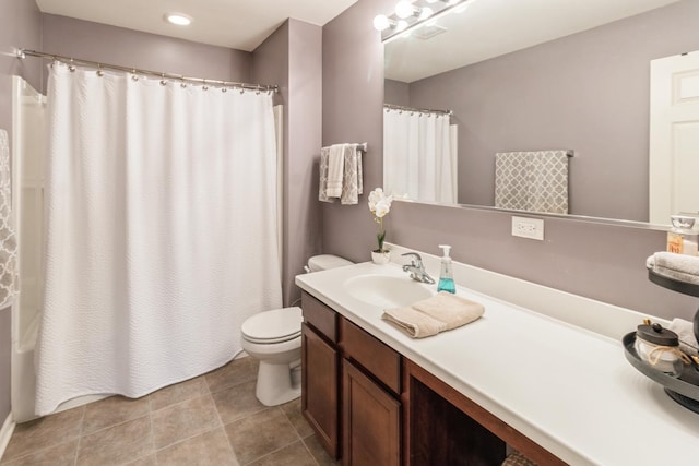 bathroom featuring vanity, tile patterned flooring, toilet, and a shower with shower curtain