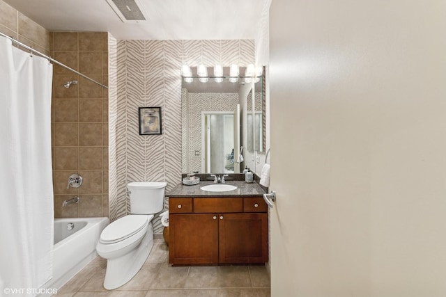 full bathroom with shower / bath combination with curtain, tile patterned floors, toilet, and vanity