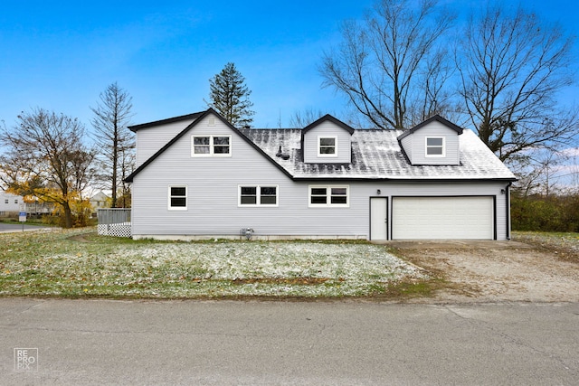 view of side of home with a garage