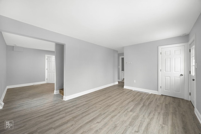 empty room with light wood-type flooring