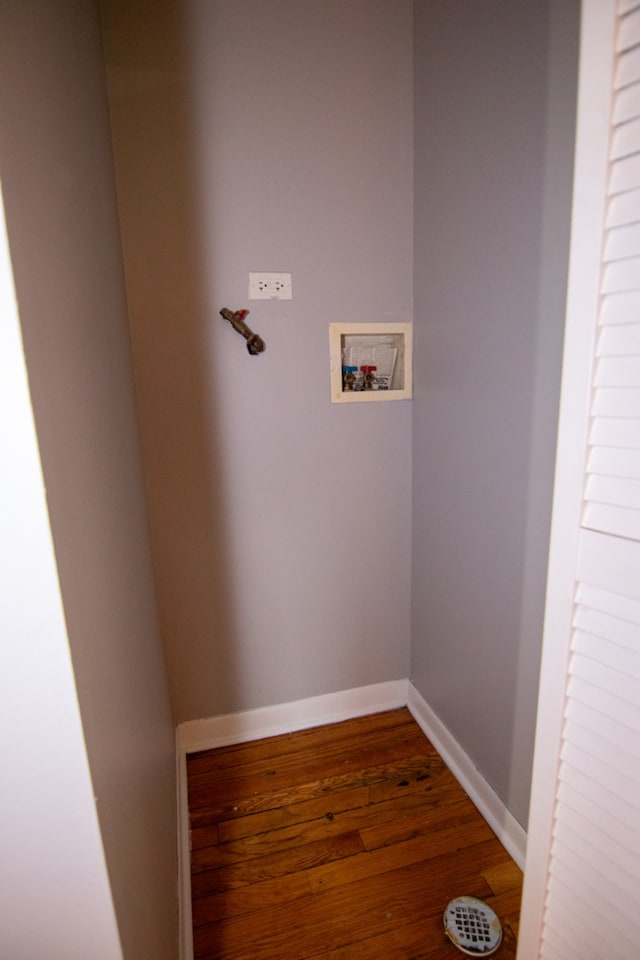 laundry room with hookup for a washing machine and dark hardwood / wood-style floors