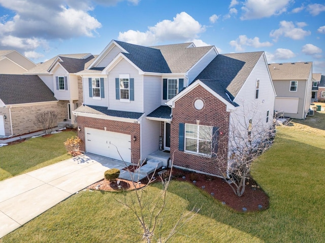 view of front of property with a garage and a front lawn