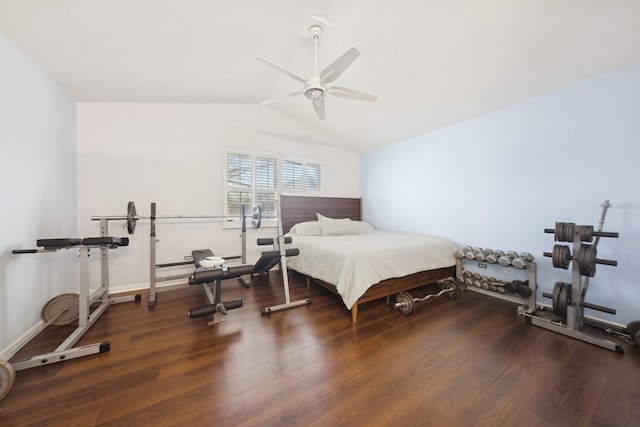 bedroom with ceiling fan, dark hardwood / wood-style flooring, and vaulted ceiling