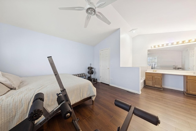 bedroom featuring vaulted ceiling, light hardwood / wood-style floors, and ceiling fan