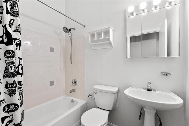 bathroom with shower / bathtub combination with curtain and toilet