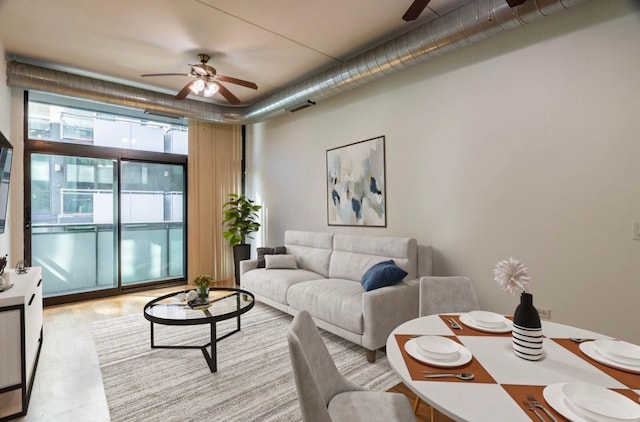 living room with ceiling fan