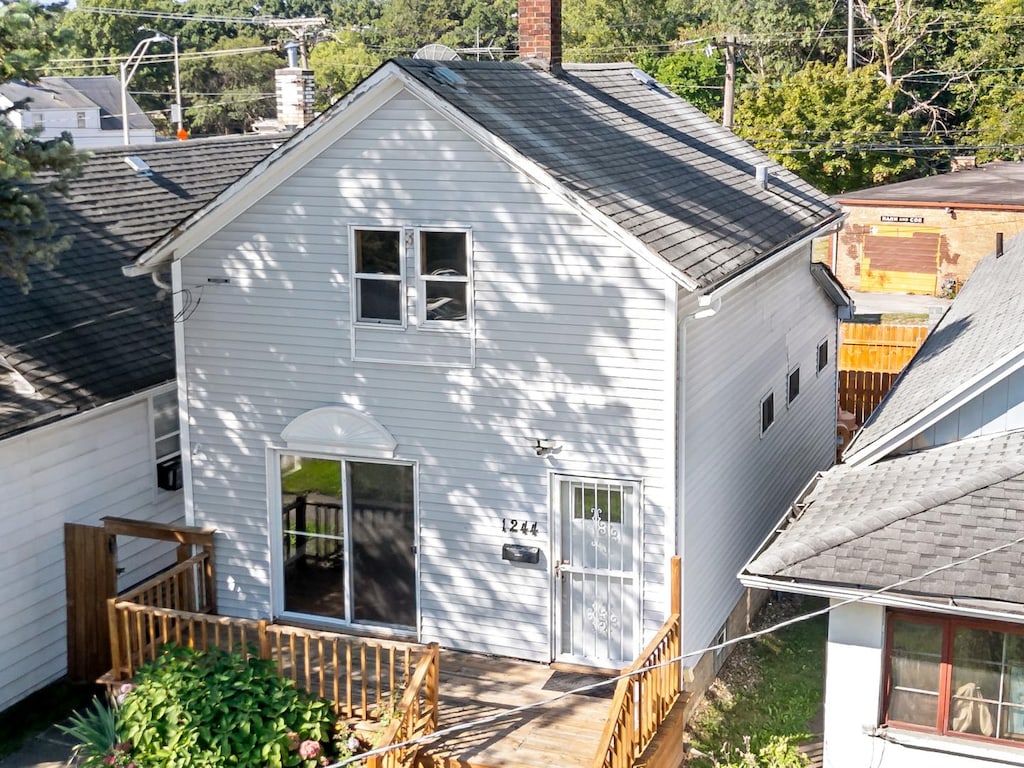 rear view of house with a deck