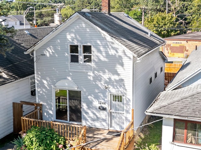 rear view of house with a deck