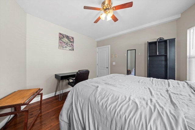 bedroom featuring dark wood-type flooring and ceiling fan