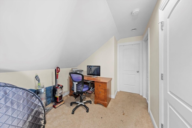 bedroom featuring carpet floors and vaulted ceiling