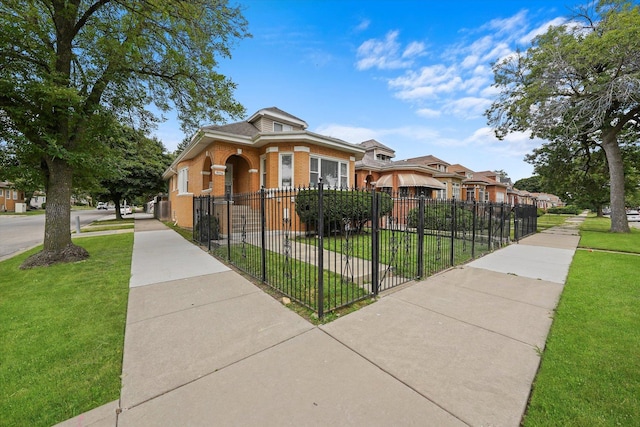 view of front of home featuring a front yard