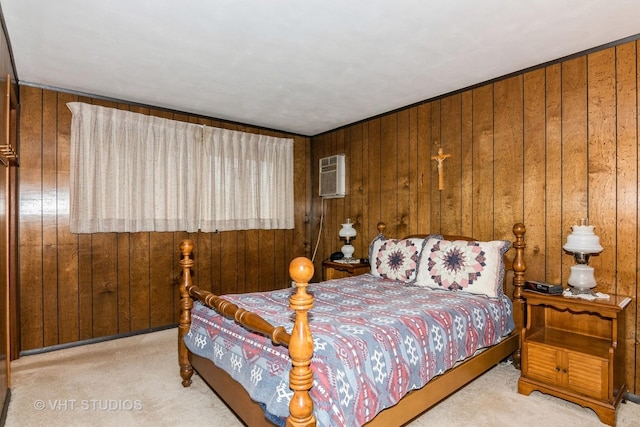 bedroom with light carpet, a wall unit AC, and wood walls