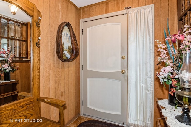 interior space featuring wood walls