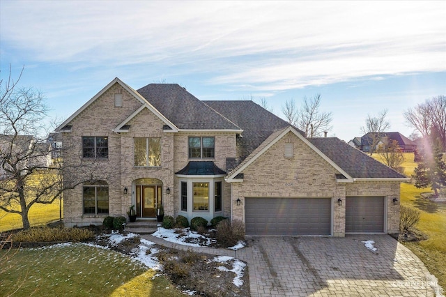 view of front of property with a garage