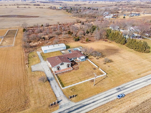 birds eye view of property featuring a rural view