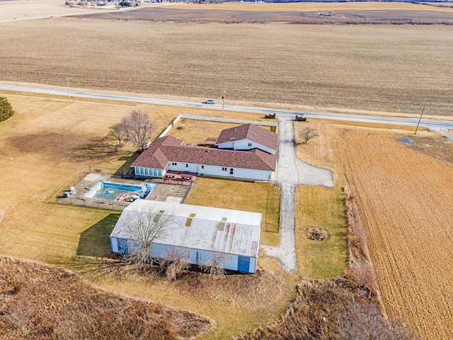 birds eye view of property featuring a rural view