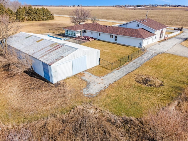 birds eye view of property featuring a rural view