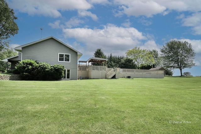 view of yard featuring a gazebo and a deck