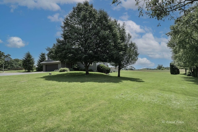 view of yard with a garage