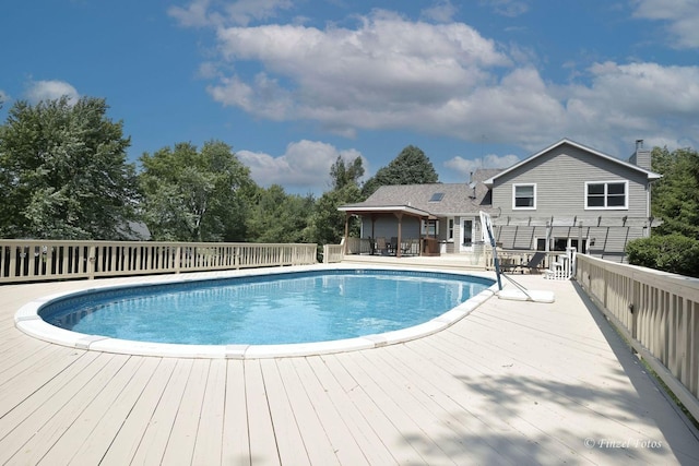 view of pool with a deck