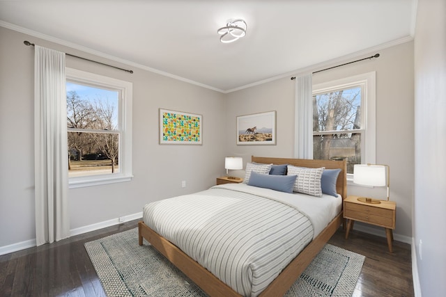 bedroom with crown molding and dark wood-type flooring