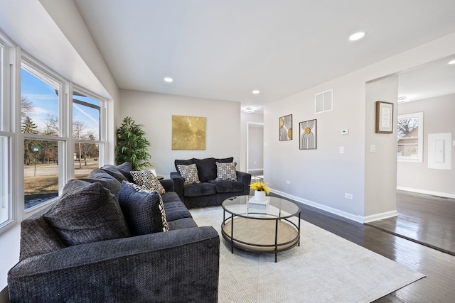 living room featuring dark hardwood / wood-style floors