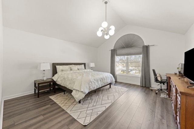 bedroom featuring vaulted ceiling, baseboards, dark wood finished floors, and a notable chandelier