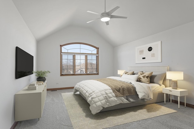 carpeted bedroom with lofted ceiling and ceiling fan