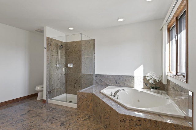 bathroom with shower with separate bathtub and toilet