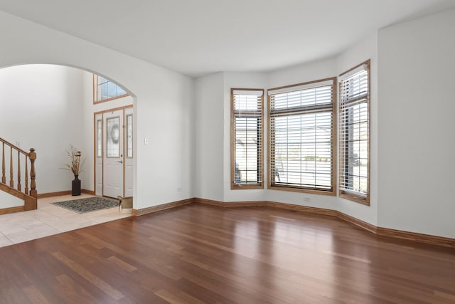 foyer entrance with light wood-type flooring