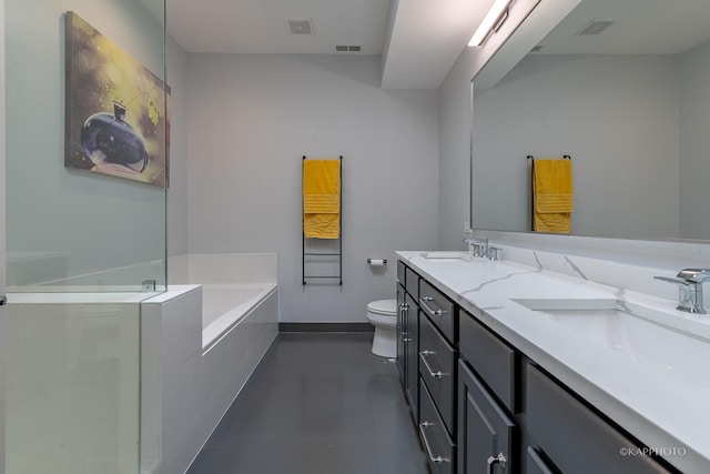 bathroom with vanity, toilet, and a bathing tub