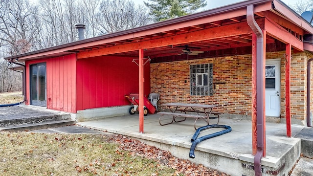 view of patio / terrace featuring ceiling fan