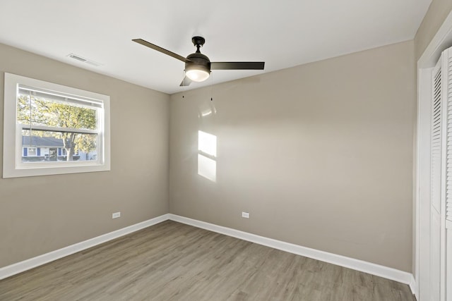 unfurnished bedroom featuring ceiling fan and light hardwood / wood-style floors